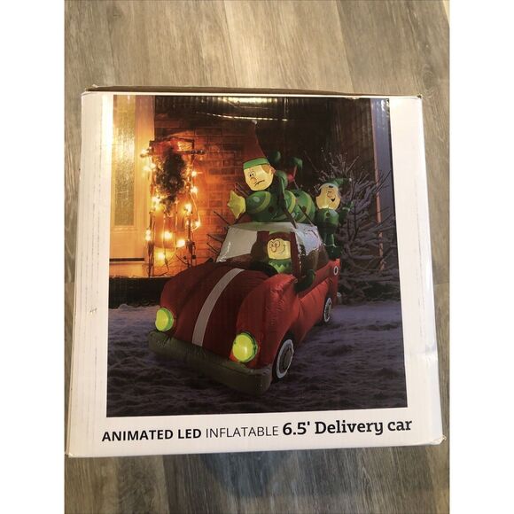 Celebrations LED Animated Elf Christmas Tree Delivery Truck 6.5 ft. Inflatable - Picture 1 of 10